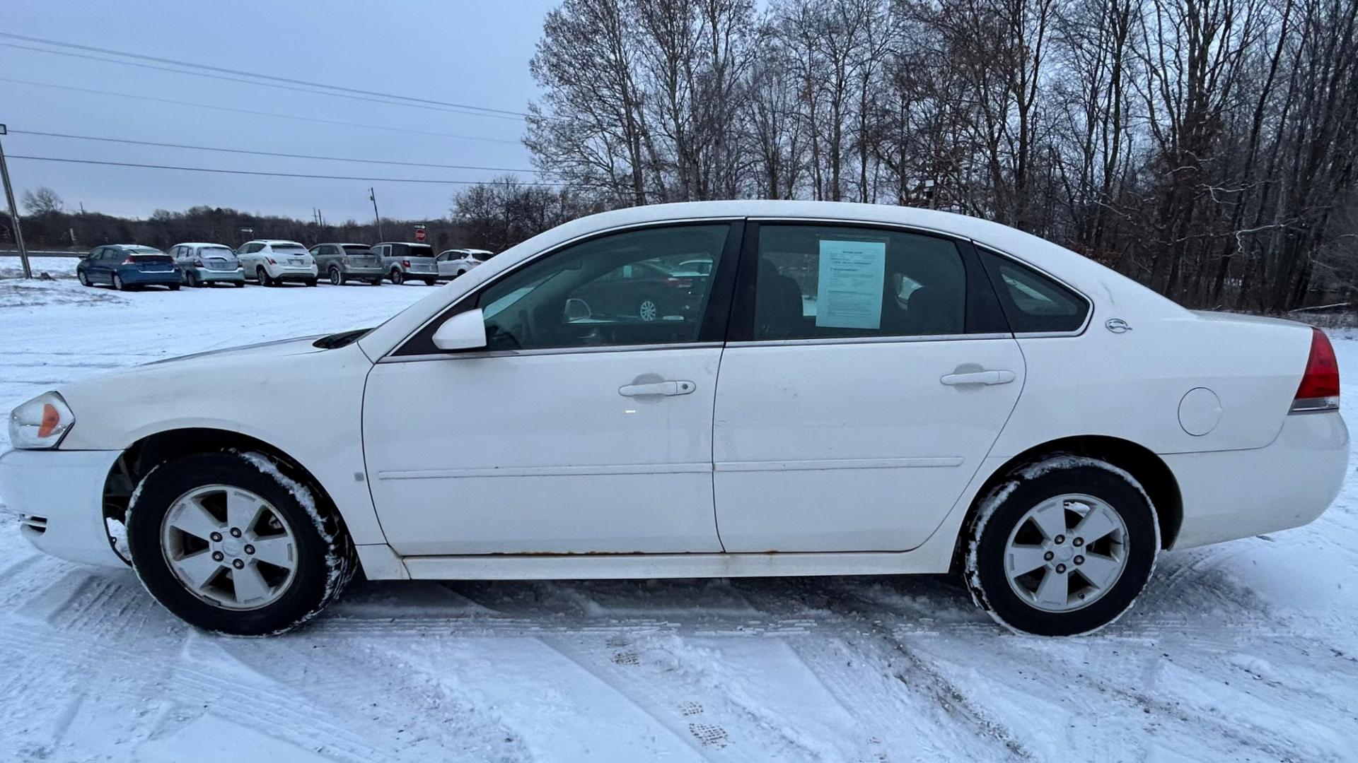 2009 White Chevrolet Impala LT (2G1WT57K791) with an 3.5L V6 OHV 12V FFV engine, 4-Speed Automatic Overdrive transmission, located at 17255 hwy 65 NE, Ham Lake, MN, 55304, 0.000000, 0.000000 - Photo#7